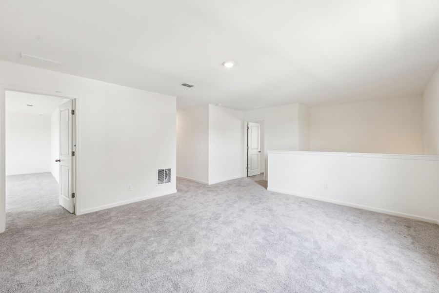 Representative unfurnished interior of a home built from the Galileo by Starlight Homes in Rolling Glen, Hutto (Image 22).