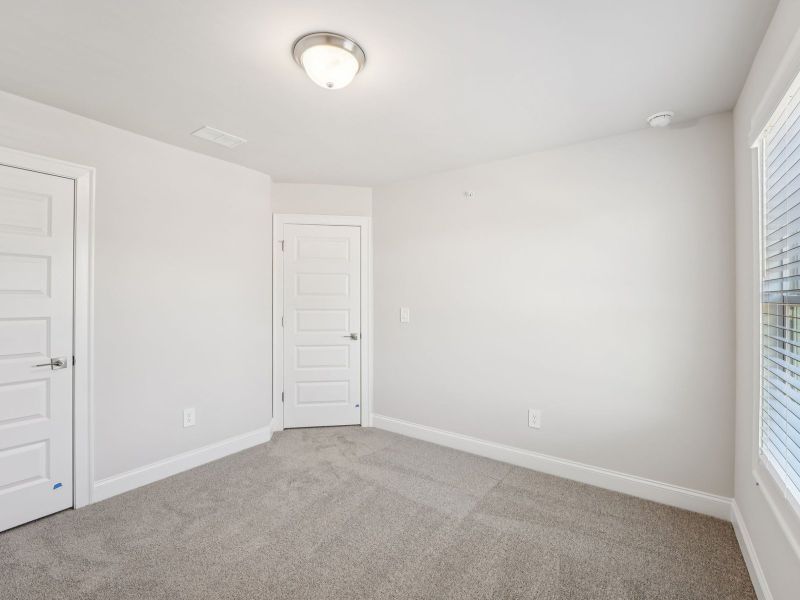 Spacious, unfurnished interior of a new home in Hemingway - Highland Series, Cumming (Image 18).