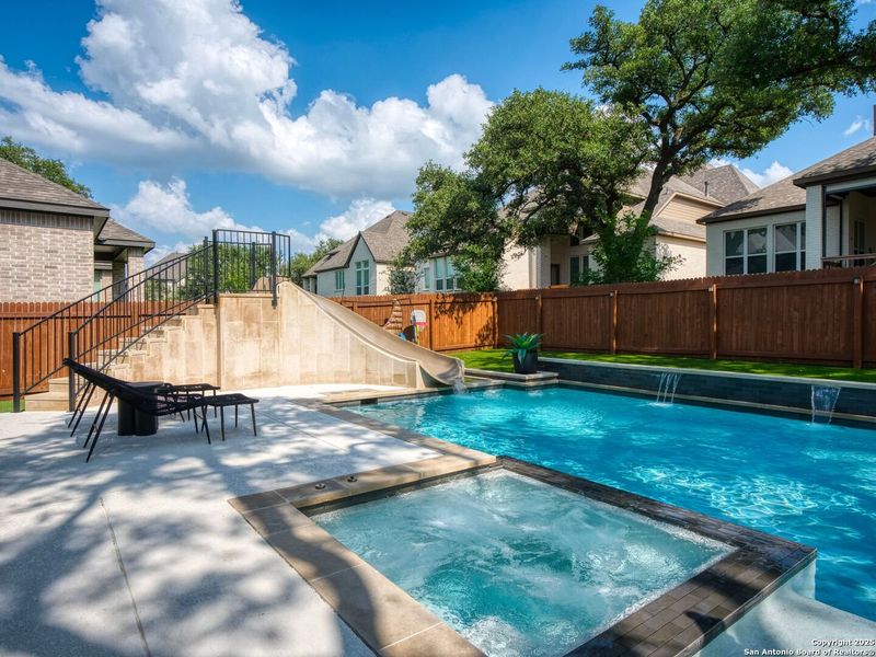 Front exterior of a new home in Balcones Creek 70', Boerne, TX, highlighting curb appeal (Image 19). Front exterior of a new home in Balcones Creek 70', Boerne, TX, highlighting curb appeal (Image 19).