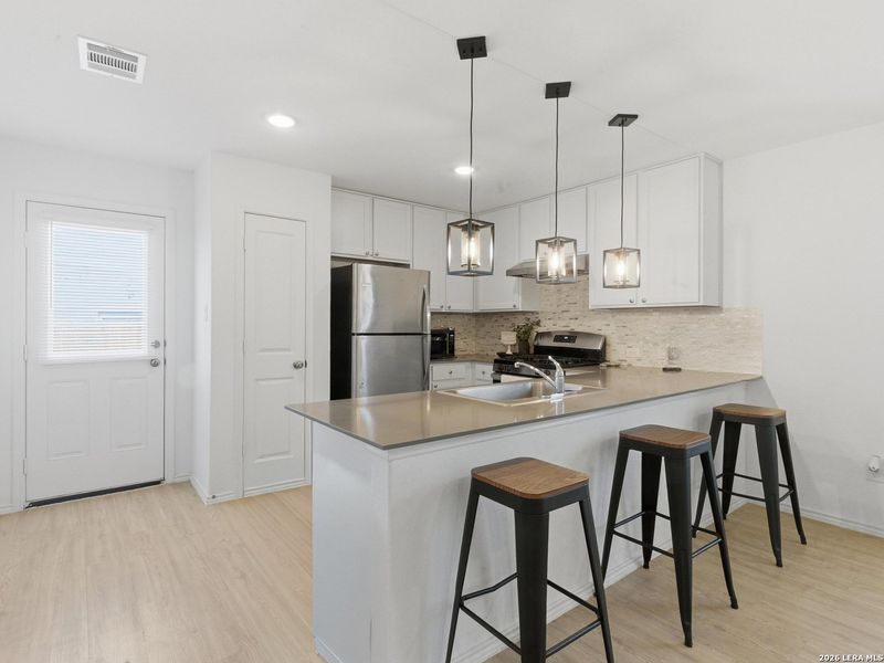 Furnished interior view inside a new home in Crescent Hills, San Antonio (Image 4).