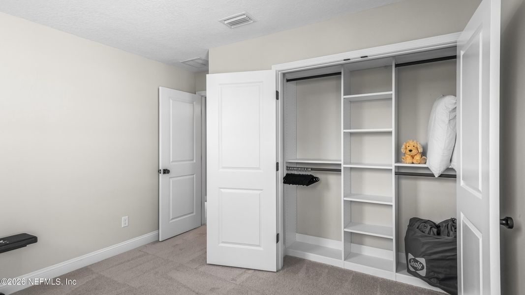 Furnished interior view inside a new home in Settler's Landing at Nocatee, Ponte Vedra (Image 12).