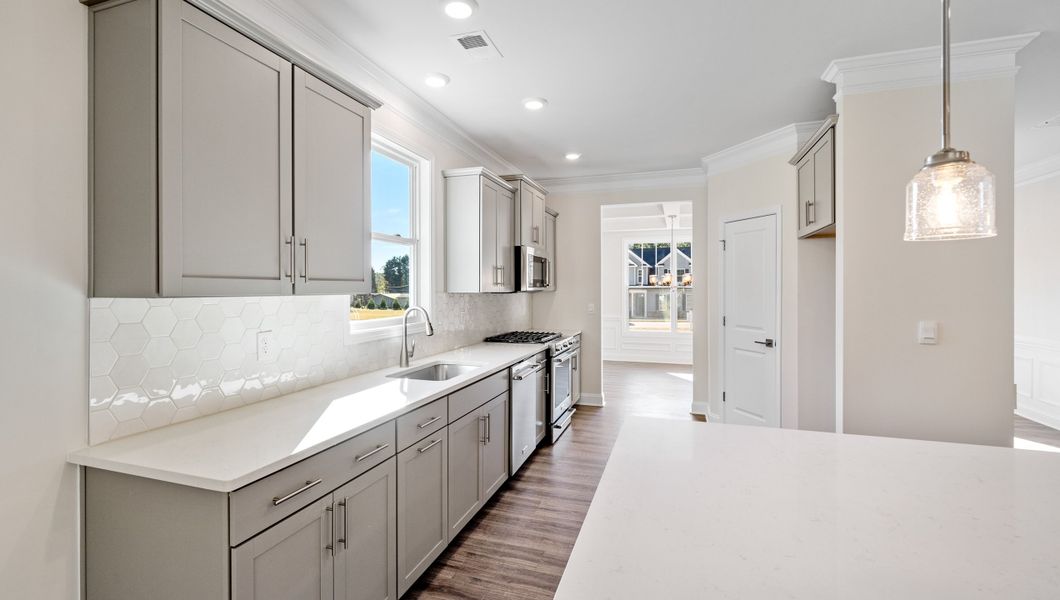 Representative furnished interior of a home built from the LONDON by D.R. Horton in Adams Glen, Greenville (Image 8).