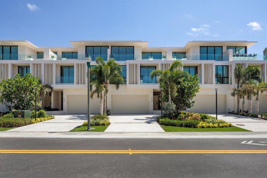 Front exterior of a new home in , Delray Beach, FL, highlighting curb appeal (Image 1). Front exterior of a new home in , Delray Beach, FL, highlighting curb appeal (Image 1).