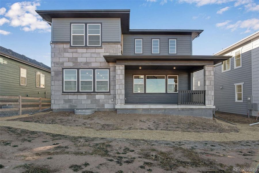 Exterior details and patio area of a home in Prelude at Sterling Ranch, Littleton (Image 29).