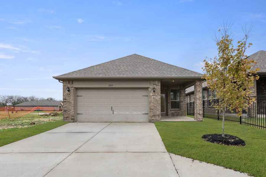 Front exterior of a new home in Redden Farms – Active Adult, Midlothian, TX, highlighting curb appeal (Image 28).