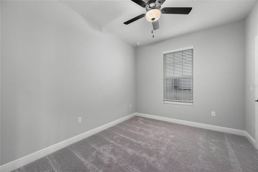 Spacious, unfurnished interior of a new home in Reunion Village, Kissimmee (Image 7).