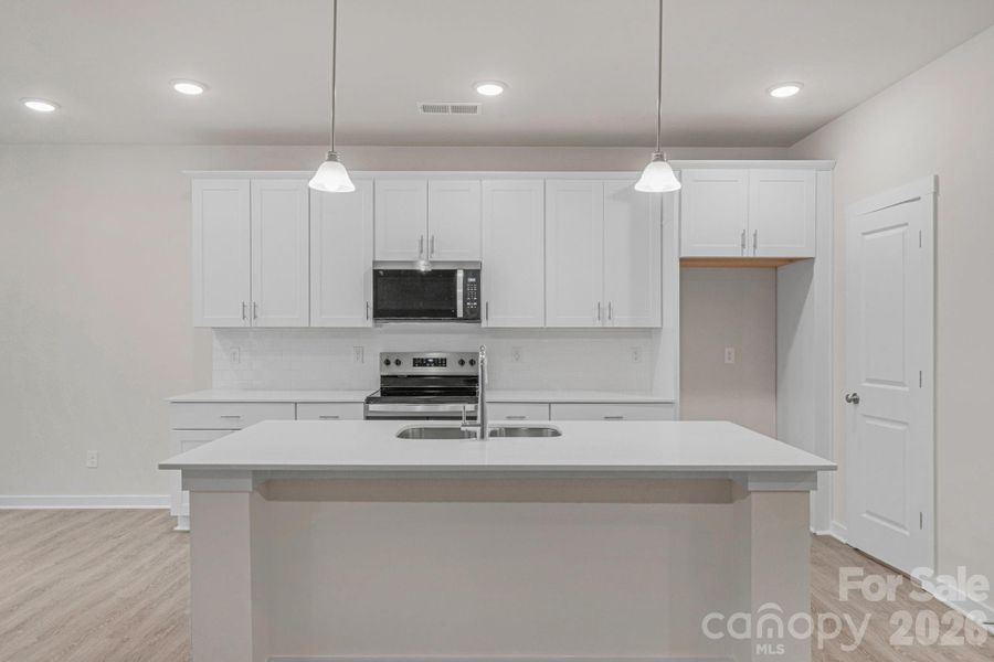 Furnished interior view inside a new home in , Monroe (Image 10).