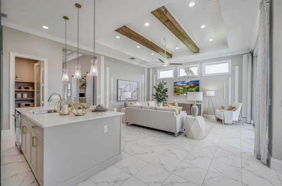 Furnished interior view inside a new home in Tesoro Club, Port St. Lucie (Image 3).