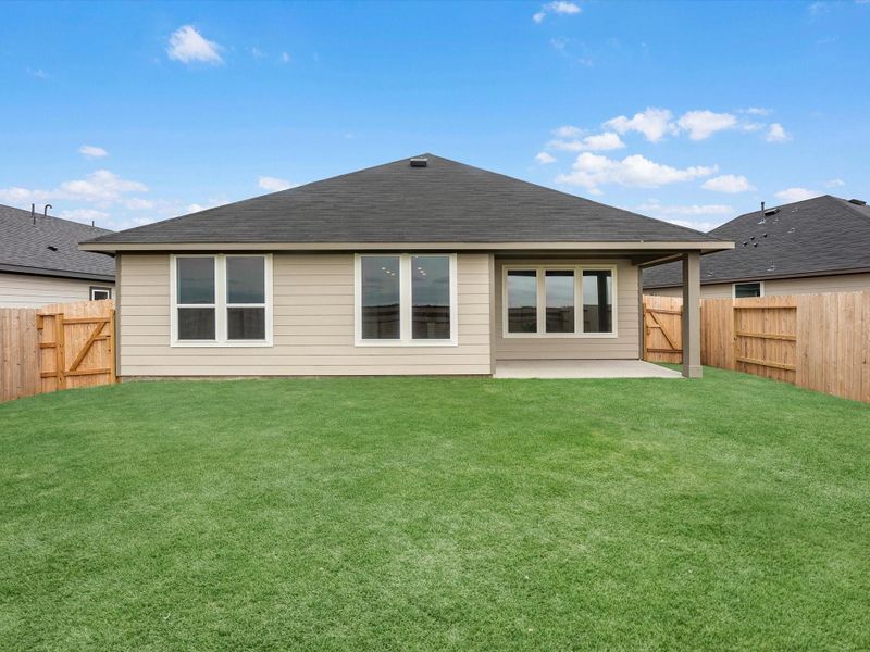 Exterior details and patio area of a home in Mason Woods, Cypress (Image 4).