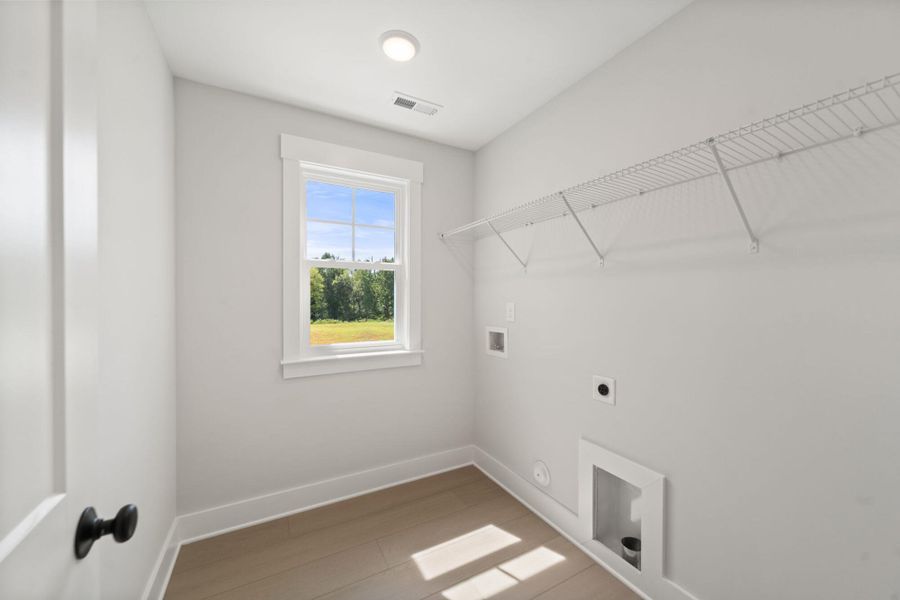 Spacious, unfurnished interior of a new home in Fiddler's Ridge, Advance (Image 25).