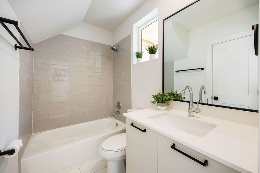 Full bathroom attached to the third bedroom.