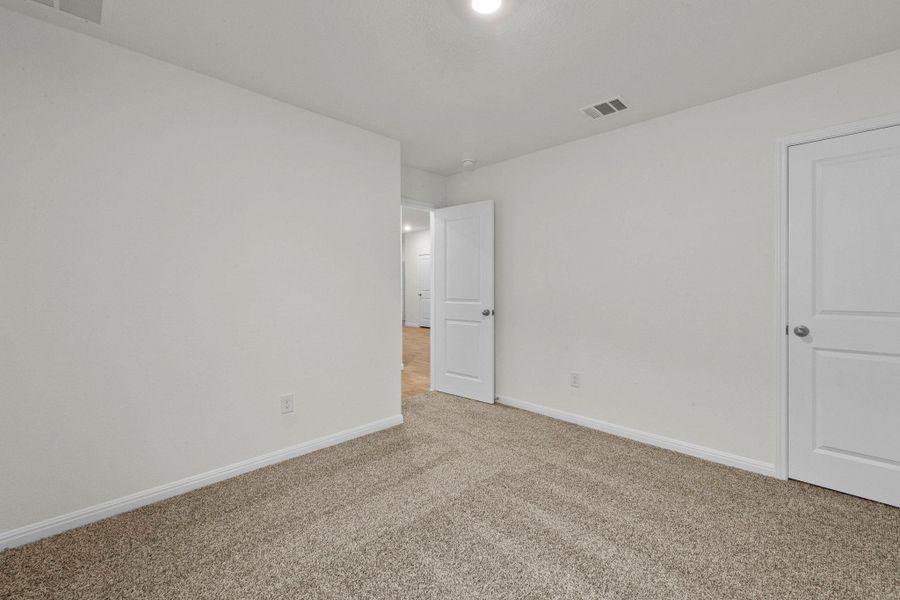 Spacious, unfurnished interior of a new home in Trace, San Marcos (Image 24).