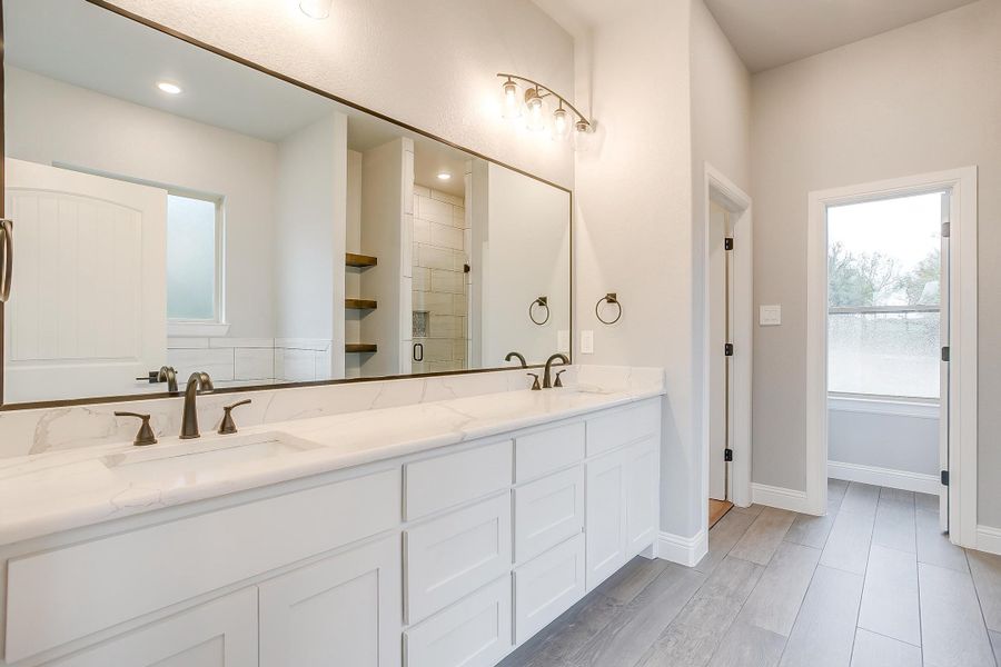Representative furnished interior of a home built from the Pecan Grove by Trinity Classic Homes in The Reserve at Shadle, Poolville (Image 18). Representative furnished interior of a home built from the Pecan Grove by Trinity Classic Homes in The Reserve at Shadle, Poolville (Image 18).