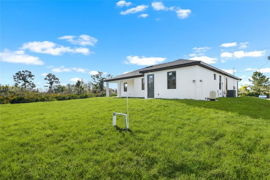 Exterior details and patio area of a home in , Lehigh Acres (Image 3).