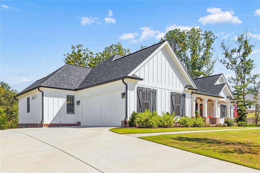 Front exterior of a new home in , Waleska, GA, highlighting curb appeal (Image 25).