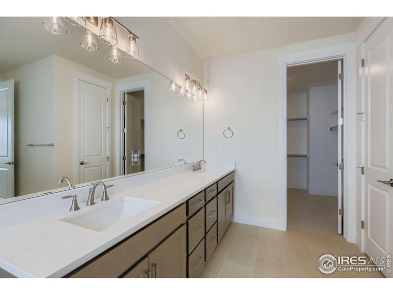 Furnished interior view inside a new home in RainDance National 60/70, Windsor (Image 14).