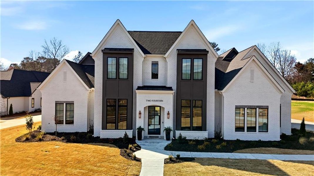 Front exterior of a new home in , Woodstock, GA, highlighting curb appeal (Image 28). Front exterior of a new home in , Woodstock, GA, highlighting curb appeal (Image 28).