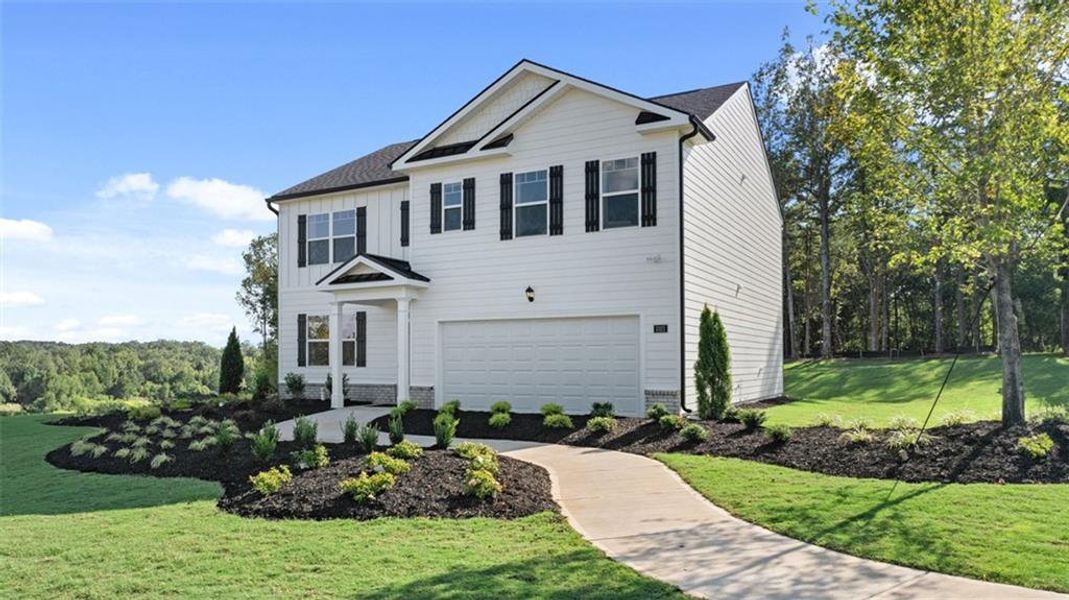Front exterior of a new home in Jackson Landing, Jefferson, GA, highlighting curb appeal (Image 26). Front exterior of a new home in Jackson Landing, Jefferson, GA, highlighting curb appeal (Image 26).
