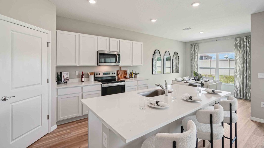 Representative furnished interior of a home built from the MADISON by D.R. Horton in Oaks Preserve, Gainesville (Image 8).