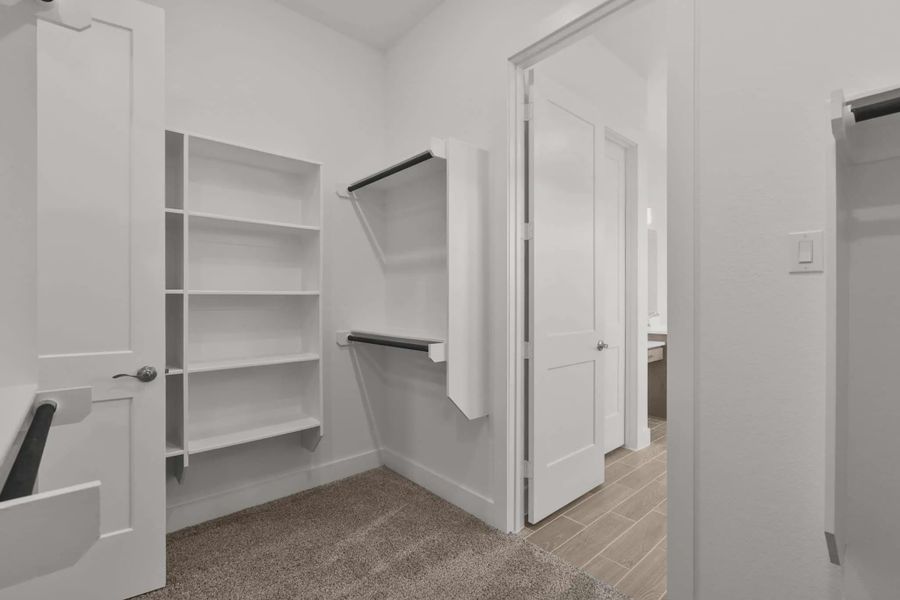 Representative furnished interior of a home built from the Sorenstam by Chesmar Homes in Riceland Alley Loads, Mont Belvieu (Image 11).