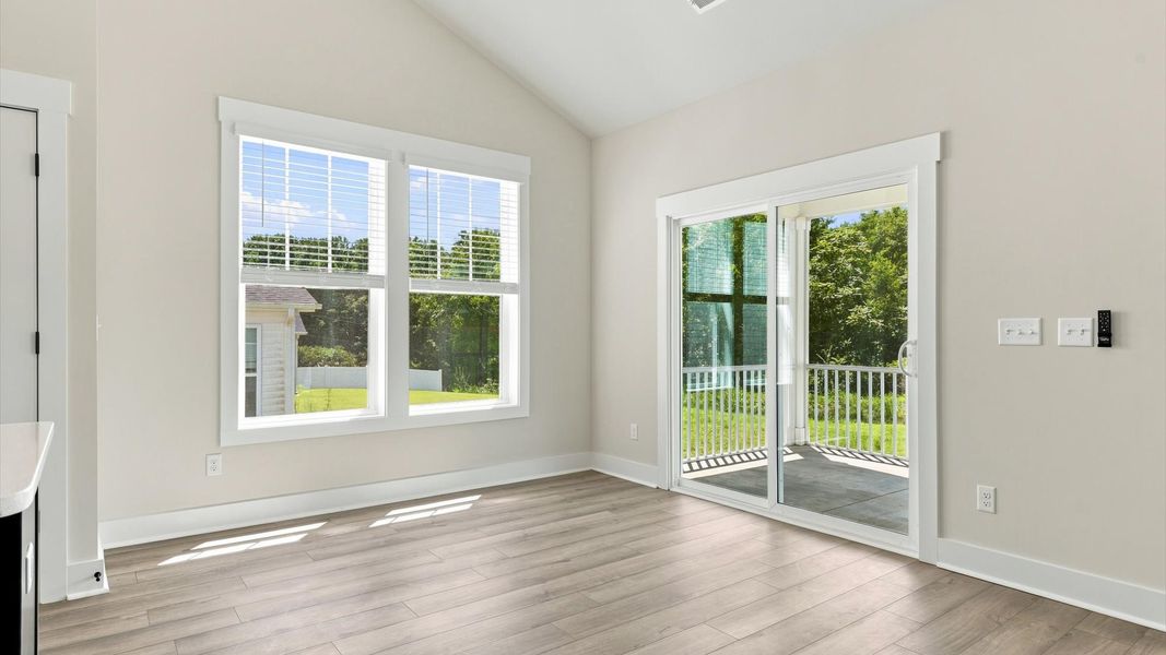 Inviting breakfast area with a seamless connection to the kitchen for everyday living at Fox Hollow
