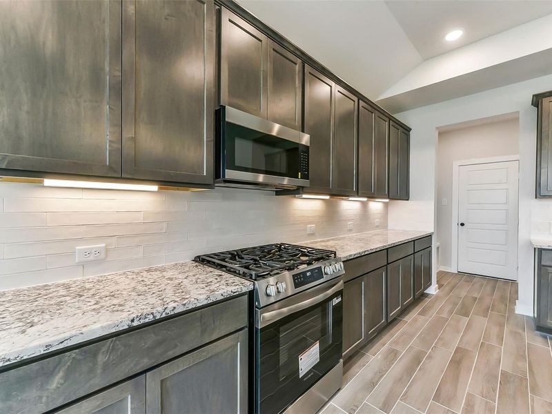 Furnished interior view inside a new home in Sundance Cove, Crosby (Image 17).