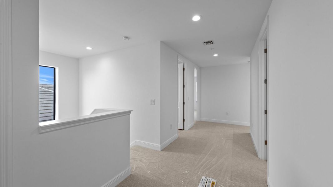 Spacious, unfurnished interior of a new home in SkySail, Naples (Image 28).