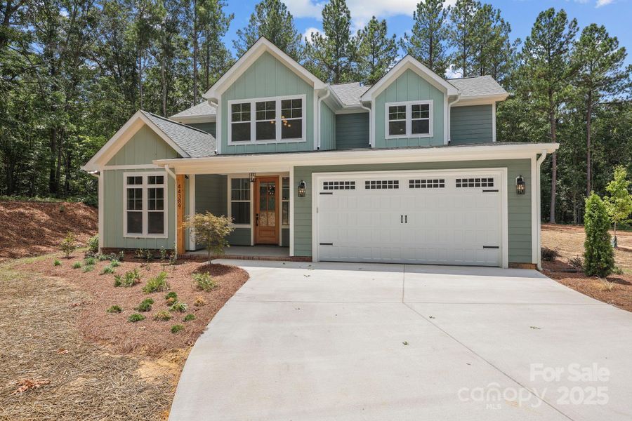 Front exterior of a new home in , Richfield, NC, highlighting curb appeal (Image 27).