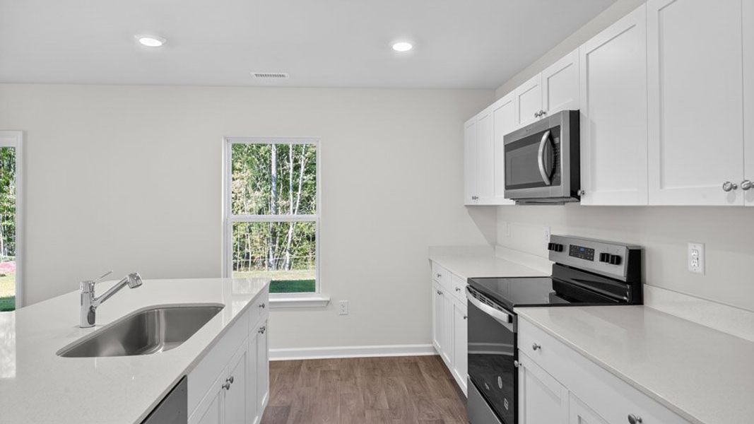 Furnished interior view inside a new home in Olive Branch, Clayton (Image 8).