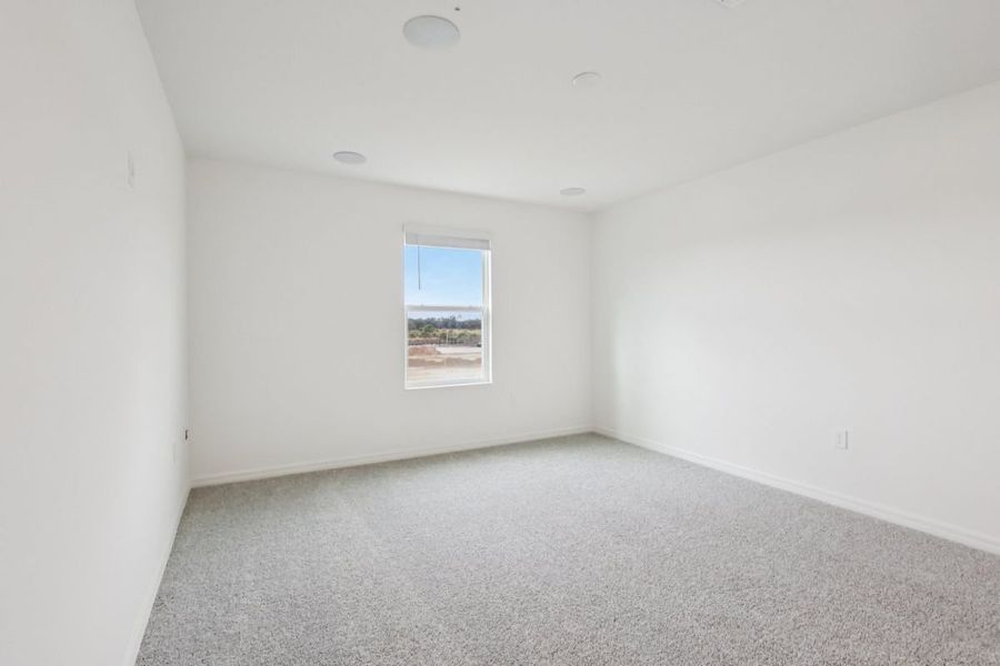 Spacious, unfurnished interior of a new home in Gardens at Waterstone I, Palm Bay (Image 7).