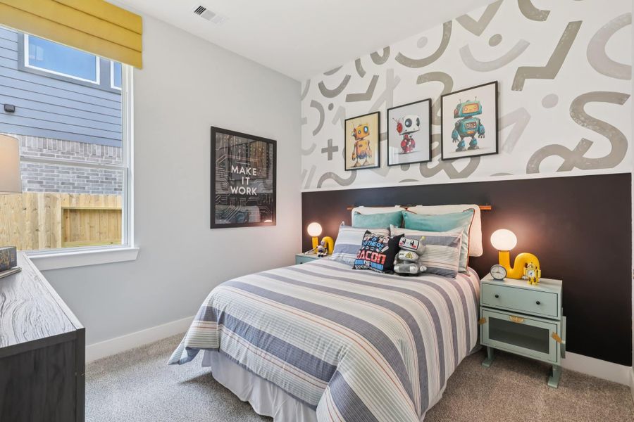 Furnished interior view inside a new home in Sunterra, Katy (Image 18).