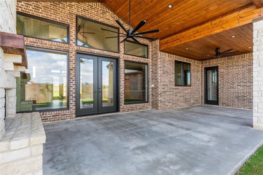 Exterior details and patio area of a home in Eagles Bluff, Hudson Oaks (Image 28).