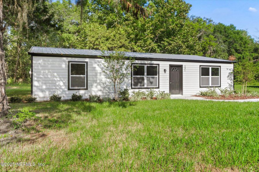 Front exterior of a new home in , Interlachen, FL, highlighting curb appeal (Image 20).