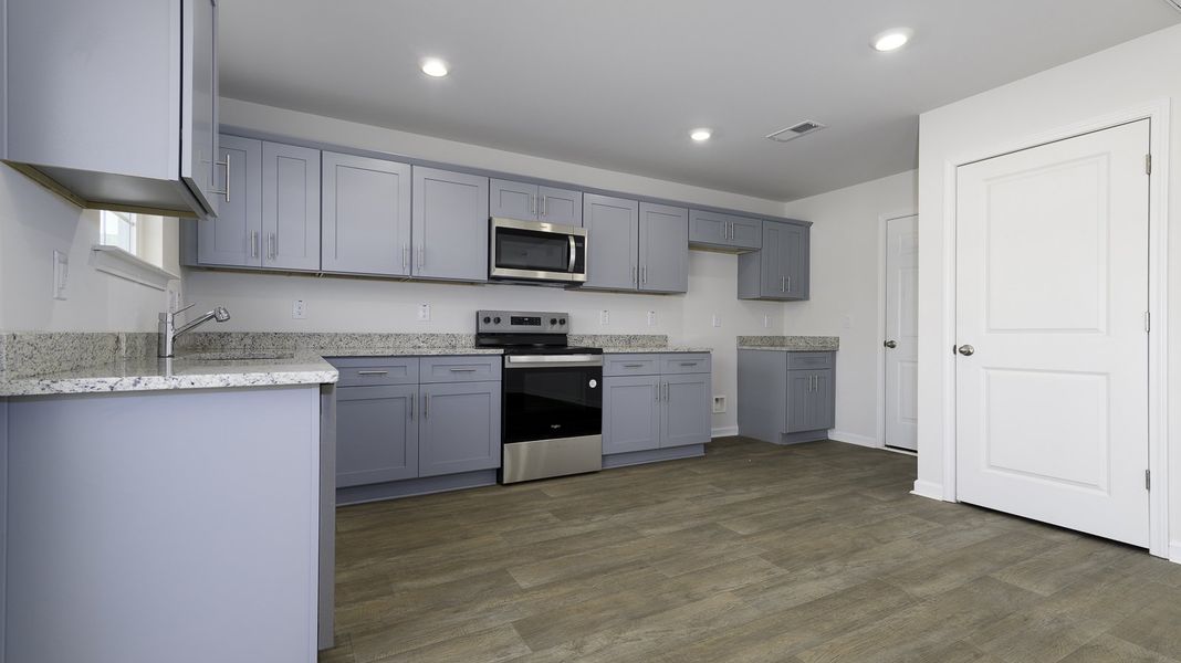 Representative furnished interior of a home built from the TAYLOR by D.R. Horton in Aspen Place, Thomasville (Image 4).