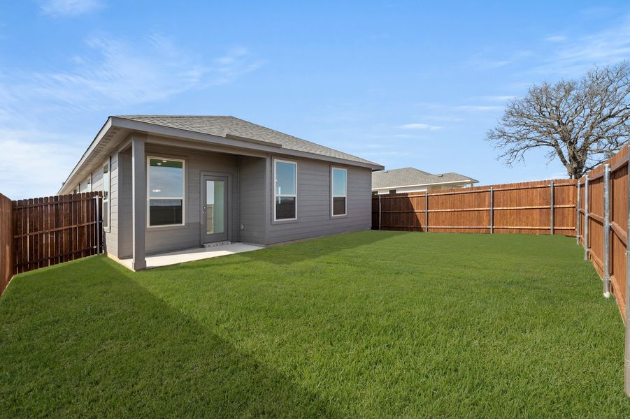 Front exterior of a new home in Belmont, Aubrey, TX, highlighting curb appeal (Image 27).
