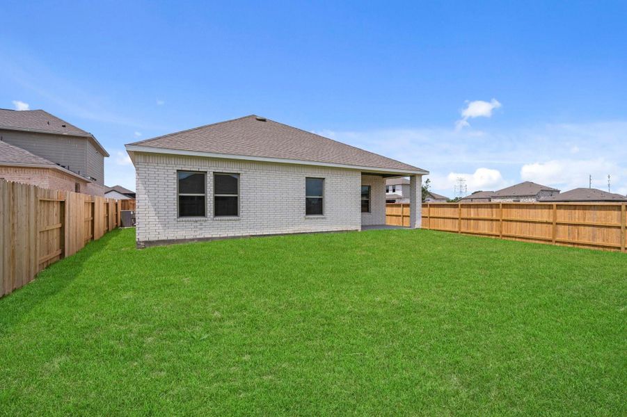 Exterior details and patio area of a home in Windrose Green, Angleton (Image 23). Exterior details and patio area of a home in Windrose Green, Angleton (Image 23).
