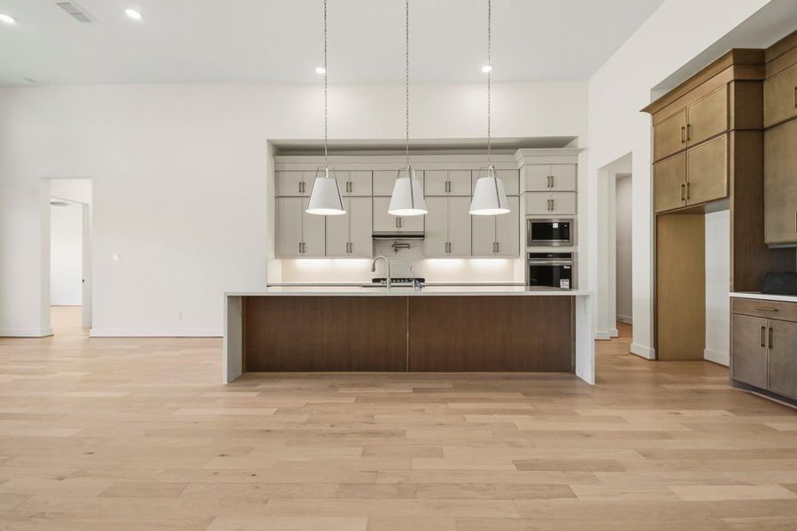 Furnished interior view inside a new home in Dunham Pointe 70', Cypress (Image 6).