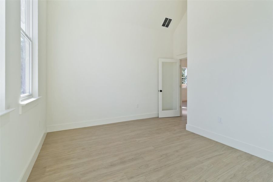 Dedicated office without virtual staging on main level with cathedral ceiling Dedicated office without virtual staging on main level with cathedral ceiling