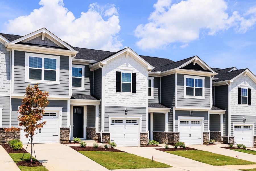 Front exterior of a new home in Vaughan Farms, Angier, NC, highlighting curb appeal (Image 1).