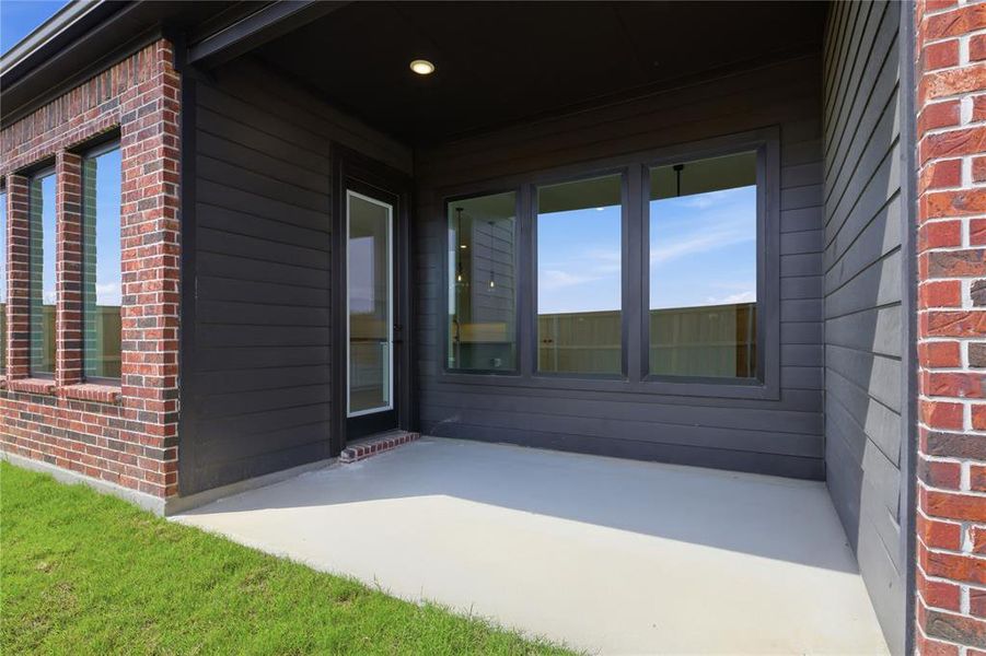 Exterior details and patio area of a home in Pecan Grove, Burleson (Image 2). Exterior details and patio area of a home in Pecan Grove, Burleson (Image 2).