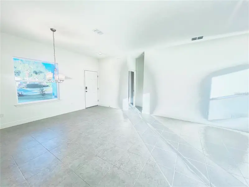 Spacious, unfurnished interior of a new home in Palm Coast: Cornerstone Collection, Palm Coast (Image 15).