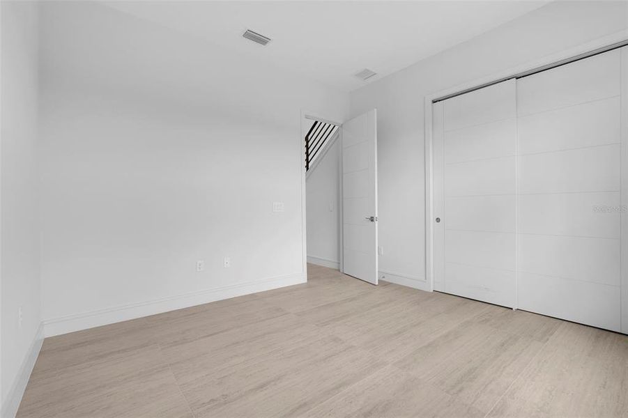 Spacious, unfurnished interior of a new home in Hampton Green at Providence, Davenport (Image 54).