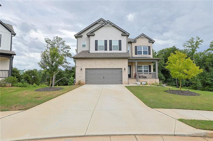 Front exterior of a new home in , Auburn, GA, highlighting curb appeal (Image 22).