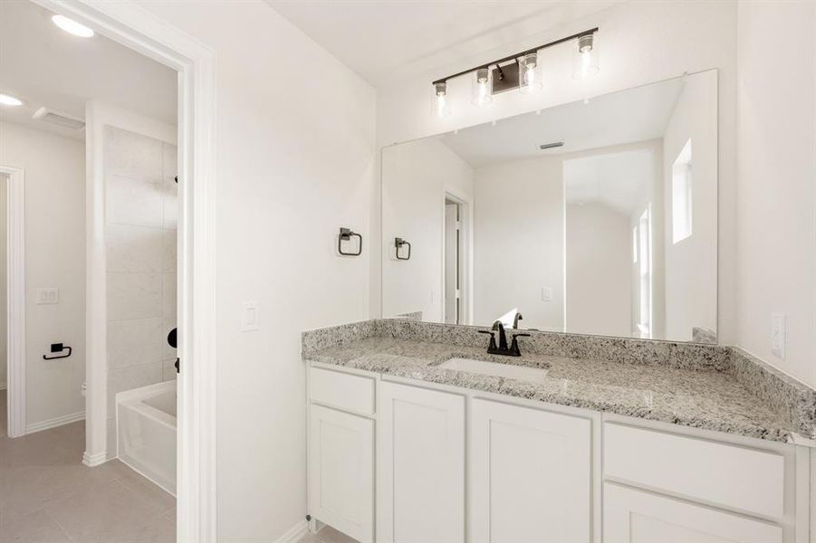 Furnished interior view inside a new home in Hunters Ridge, Crowley (Image 12).