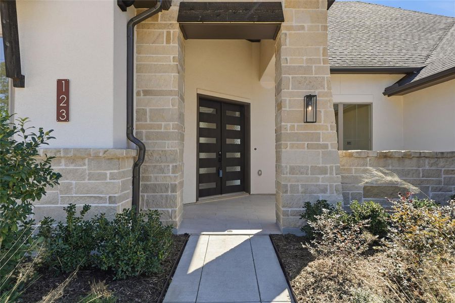 Exterior details and patio area of a home in Audubon 80’s, Magnolia (Image 3).