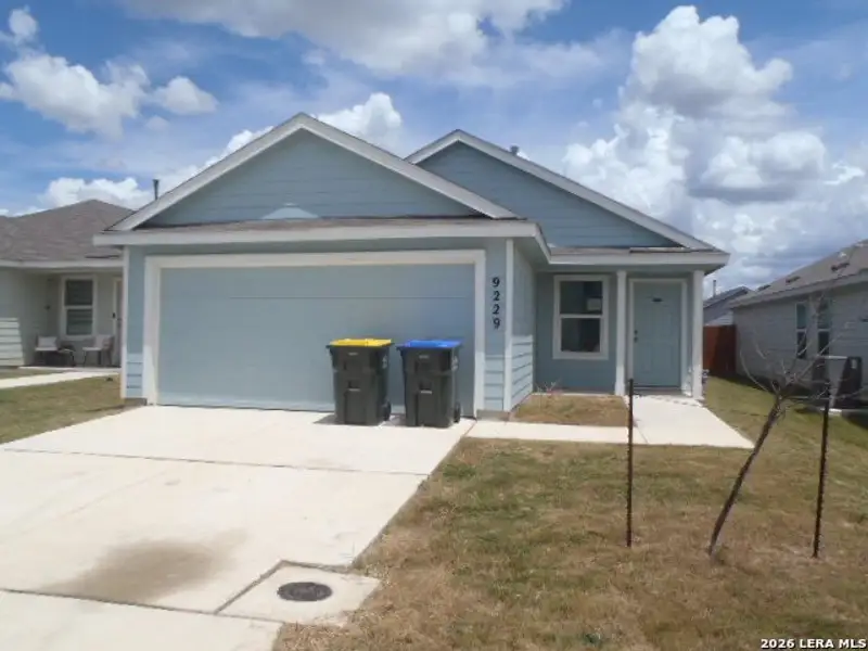Front exterior of a new home in Navarro Ranch, Seguin, TX, highlighting curb appeal (Image 1). Front exterior of a new home in Navarro Ranch, Seguin, TX, highlighting curb appeal (Image 1).