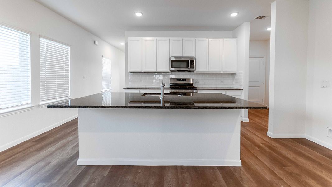 Furnished interior view inside a new home in The Canopies, Splendora (Image 5).