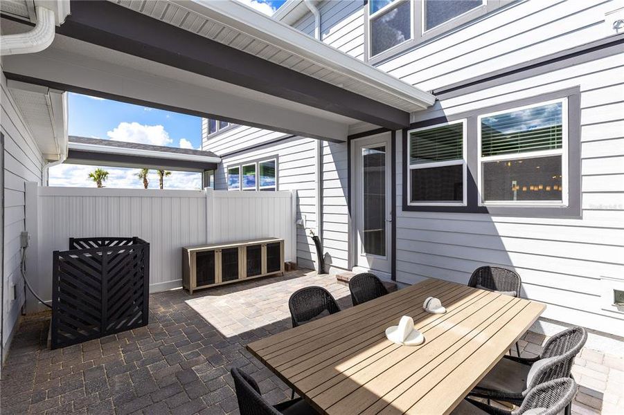 Exterior details and patio area of a home in EverBe, Orlando (Image 24).