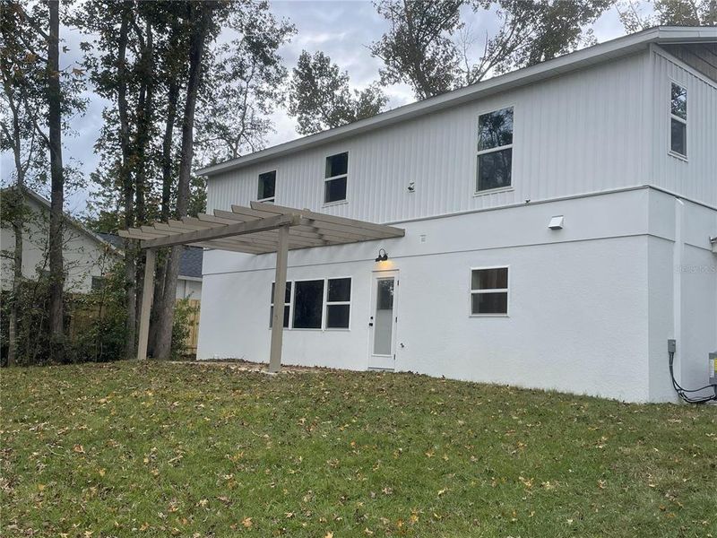 Exterior details and patio area of a home in , Brooksville (Image 4).