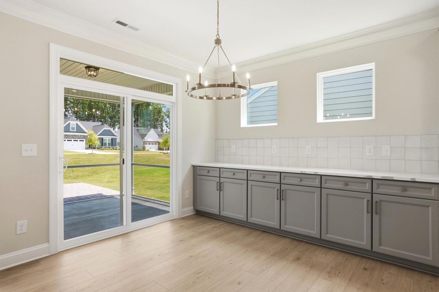 Furnished interior view inside a new home in Heritage - 55+ Community, Indian Trail (Image 9).